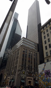 Exterior of Tiffany's, with the giant "star" at Fifth Avenue and 57th St. in the left foreground. Trump Tower, where the president-elect was interviewing for cabinet posts, is at the right.