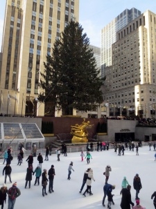 Ice skaters, with Prometheus (Paul Manship) and the Rockefeller Center Christmas tree.